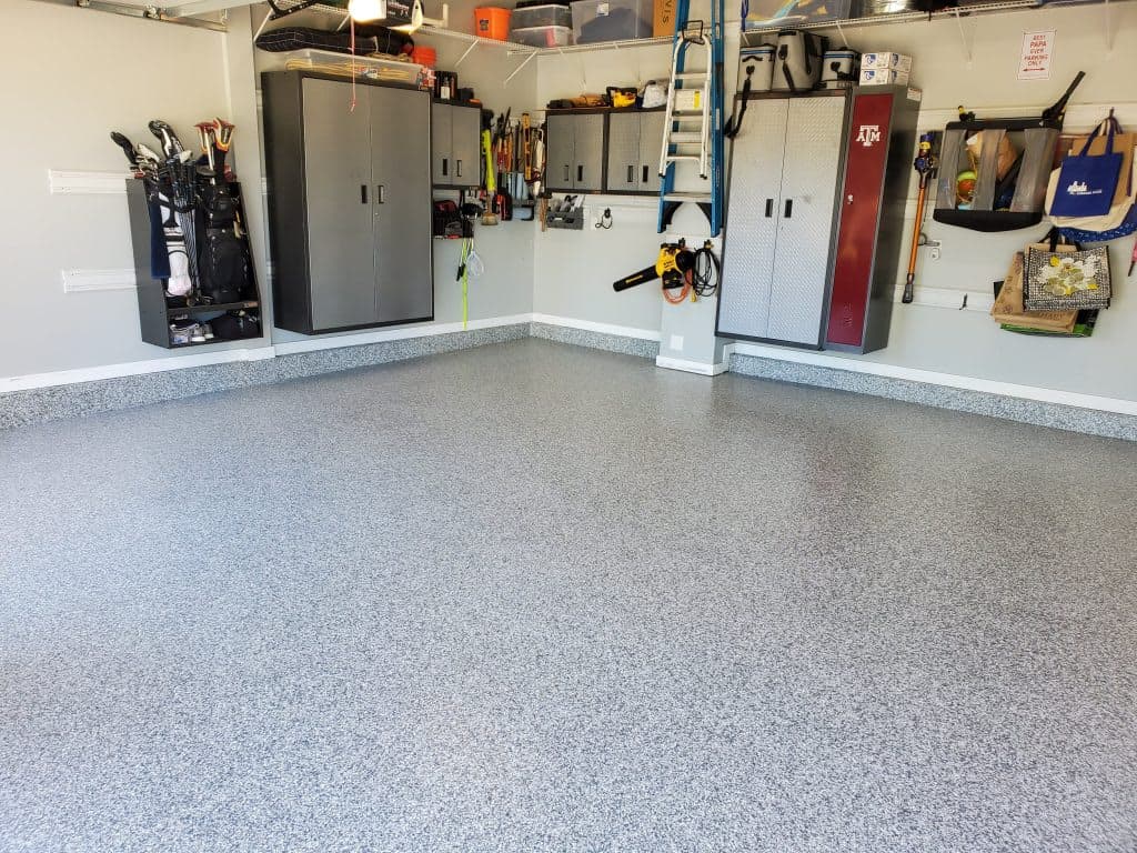 Custom flake floor design with marble and metallic finish